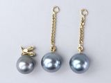 three pairs of grey pearls and a gold chain on a white background