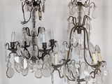 a chandelier hanging from the ceiling in a room