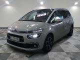 the citrole is parked on a checkered floor in a garage