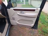 a car door open with the driver ' s side door open