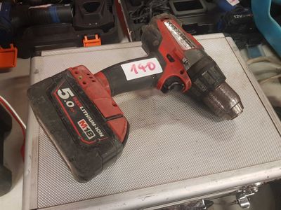 two tools that are sitting on top of a table