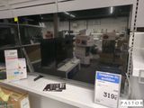 une photo d'un bureau d'ordinateur sur lequel se trouve un écran