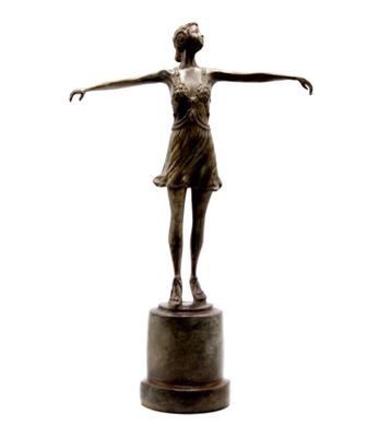bronze statue of a woman standing on a pedestal with her arms outstretched