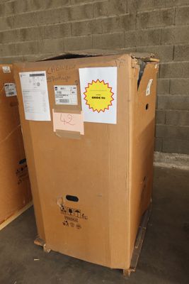 two cardboard boxes that are stacked on top of each other