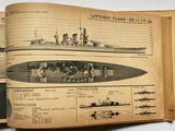 an old book with a picture of a battleship on it