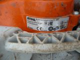 a close up of a chainsaw with a label on it