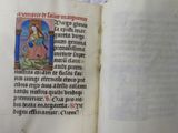 an open book with a picture of a woman holding a baby