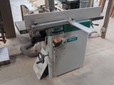 a machine that is sitting on the floor in a building