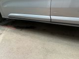 a car that is parked on the side of the street