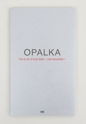 a white book with the words opalka written on it