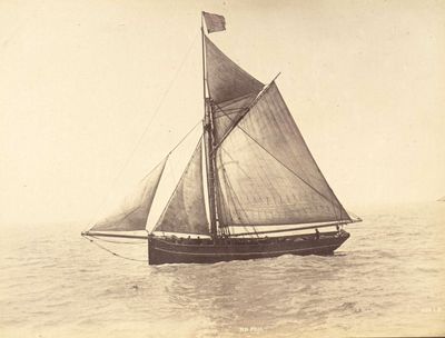 a black and white photo of a sailboat in the water