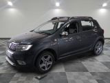 a picture of a black car parked in a garage