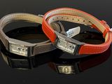 two bracelets that are sitting next to each other