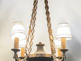 an image of a chandelier with three lights hanging from it
