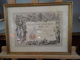 an antique framed picture of a certificate with a picture of a man and a woman