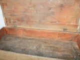 an old wooden trunk with a handle and a latch