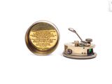 une image représentant un réchaud miniature muni d'un couvercle et d'une cuillère