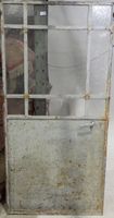 Deux portes atelier en fer peint et verre.