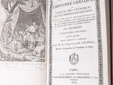 an open book that is sitting on a table