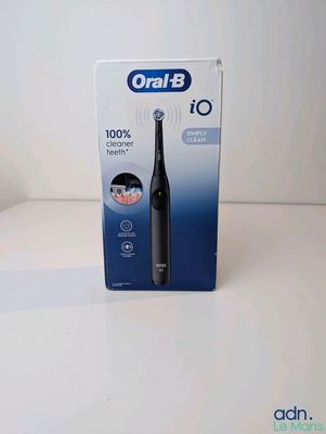 a box of toothbrushes sitting on a table