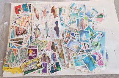 a white tray with stamps on it on a table