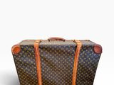 Valise Louis Vuitton en toile Monogram avec finitions en cuir