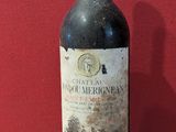 a bottle of wine that is sitting on a table