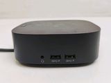 an image of a black device sitting on top of a white table