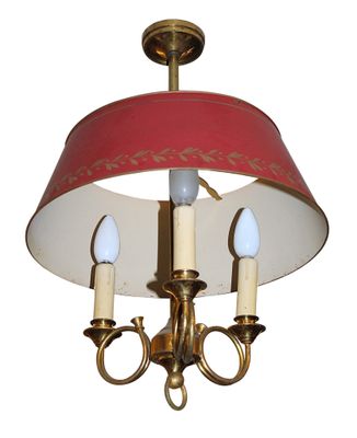 a picture of a chandelier with a red shade on it