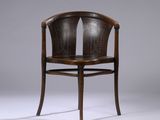 an image of a wooden chair with a brown leather seat