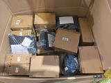 un carton rempli de boîtes et d'autres objets