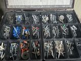 many different types of screws in a case