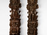 paire de figurines en bois sculpté représentant une femme et un homme
