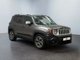 the jeep renegade is parked in a large room with a black floor