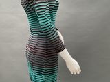 a mannequin mannequin dress with green and black stripes