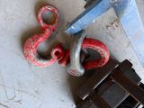 a close up of a pair of scissors and a clamp
