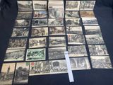 a lot of old postcards that are on the table