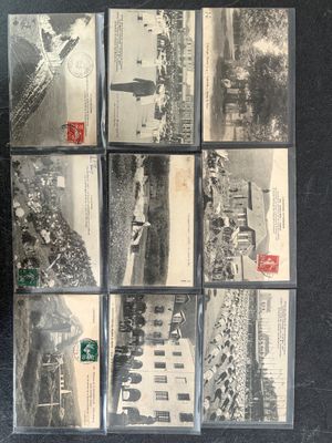 a black and white photo of a bunch of old postcards