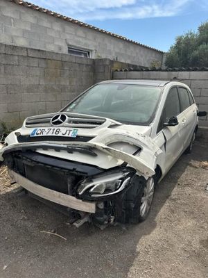 an image of a car that has been badly damaged