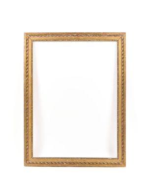 a gold frame with a decorative pattern on a white background
