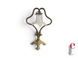 a wall light that is hanging on the wall