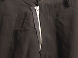 black pants with a zipper on the side and a zipper down the side