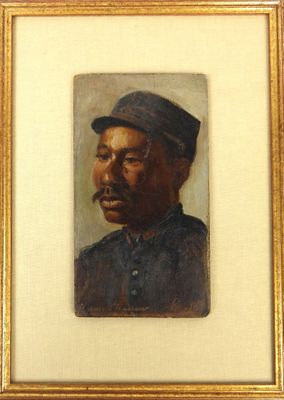 portrait of a man in a hat and uniform in a gold frame