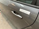 a car door with a sticker on it and a sticker on the side of the car
