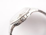 a close up of a wrist watch on a white surface