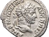 a silver coin with an image of a man on it
