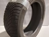 a close up of a tire on a white surface