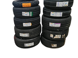 several tires stacked on top of each other on a white background