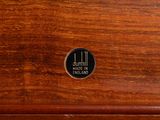 a close up of a drawer with a clock on it