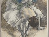 an image of a drawing of a woman bending over on the ground